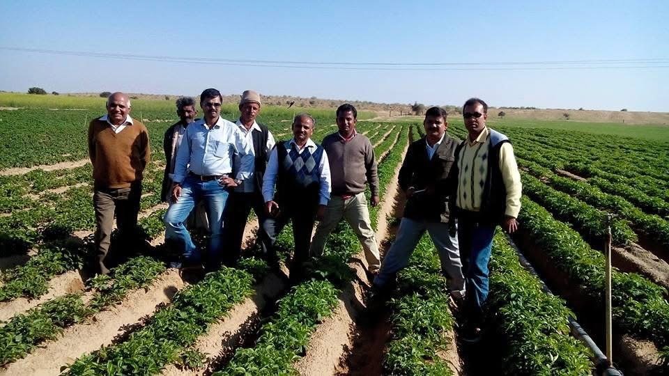 Nripendra Jha Technico wit Potato Farmers